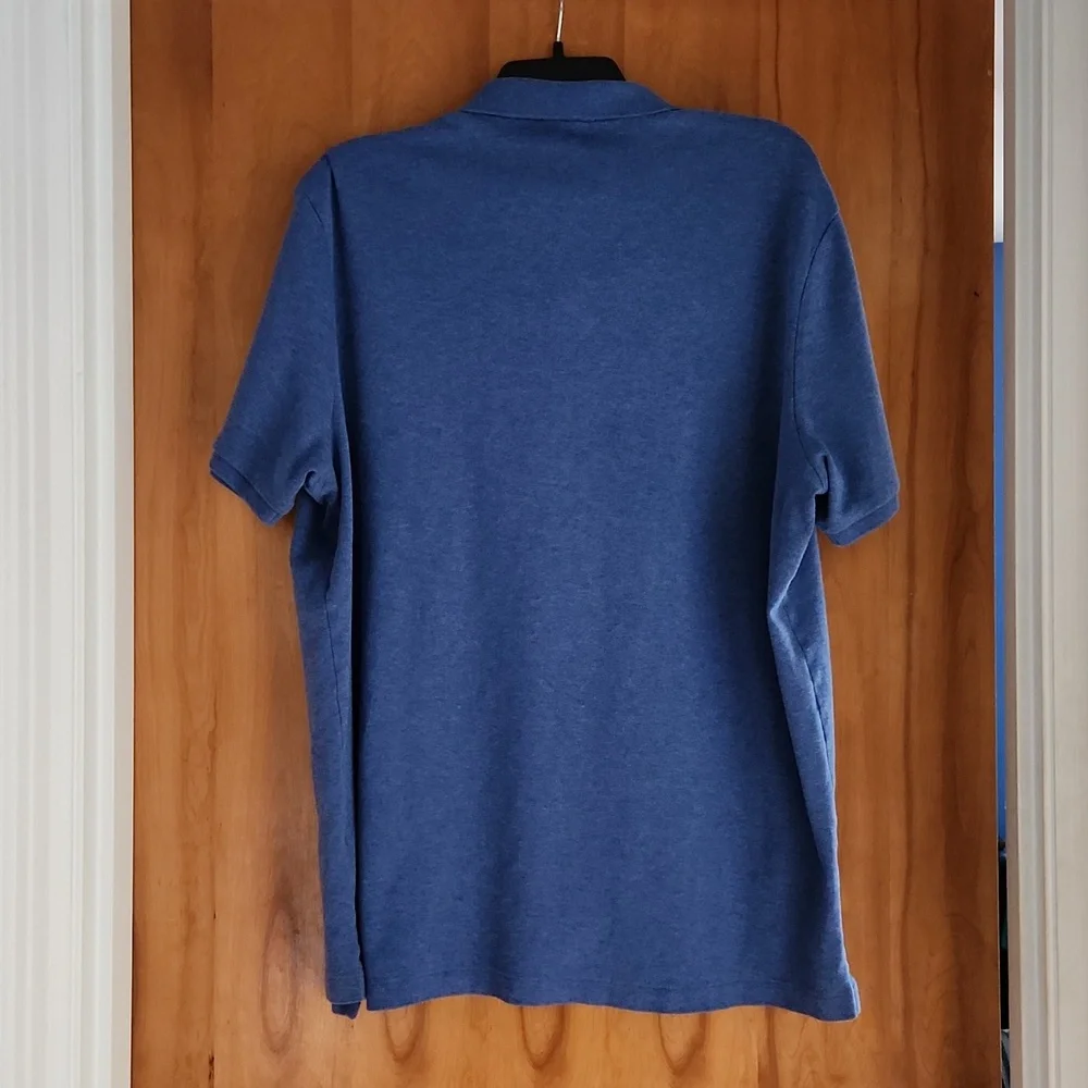 Raulph Lauren Men's blue polo shirt. Size XL/TG. Like New Condition.